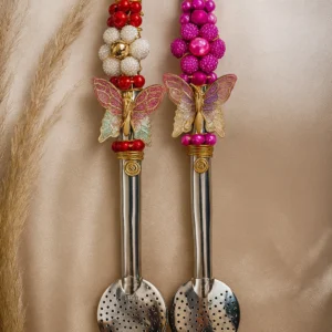 BOMBA INOX COM BORBOLETA GRANDE E FLOR DE PÉROLA